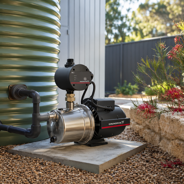Domestic water pressure pump installed beside a rainwater tank at a Western Australian home